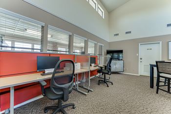 Business office with workstations and high ceilings